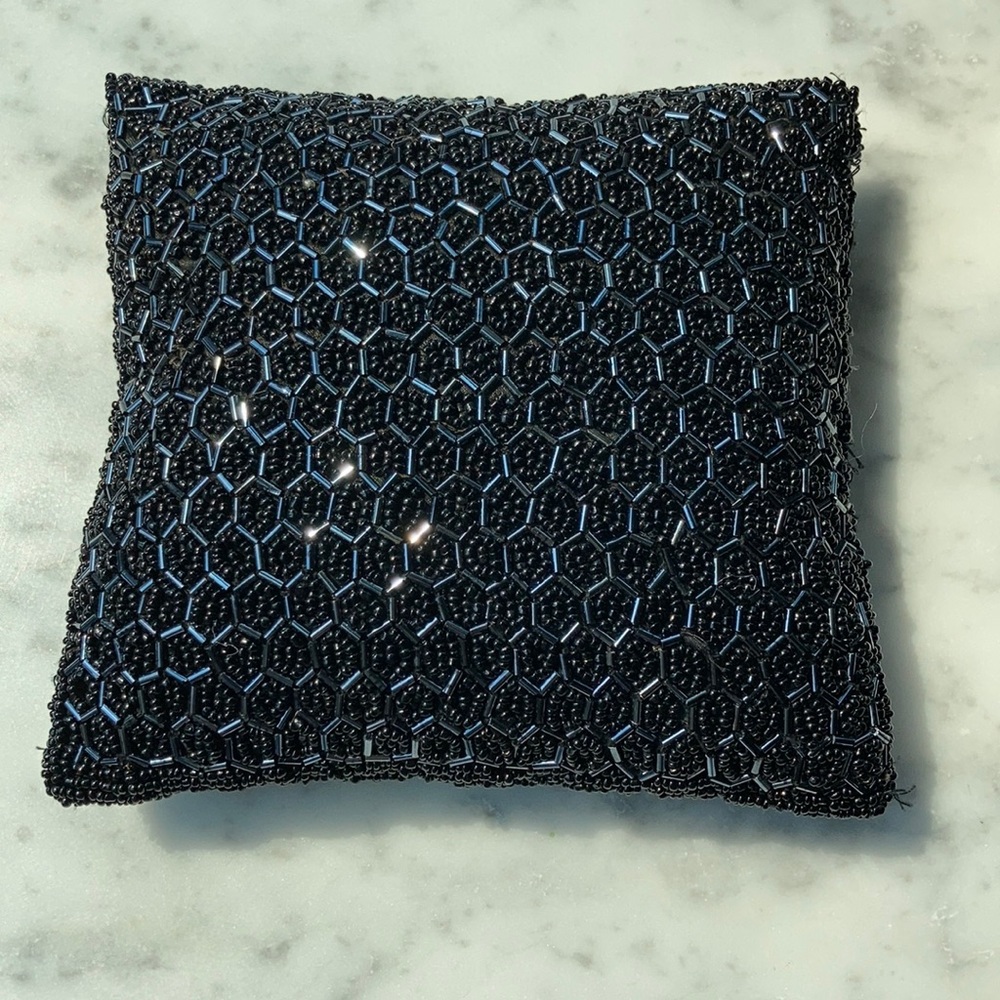 Hand embroidered small accent pillow